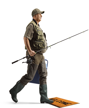 Man in fishing gear walking